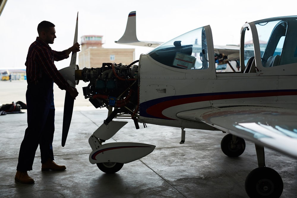 Aircraft mechanic gaining OJT experience on general aviation aircraft