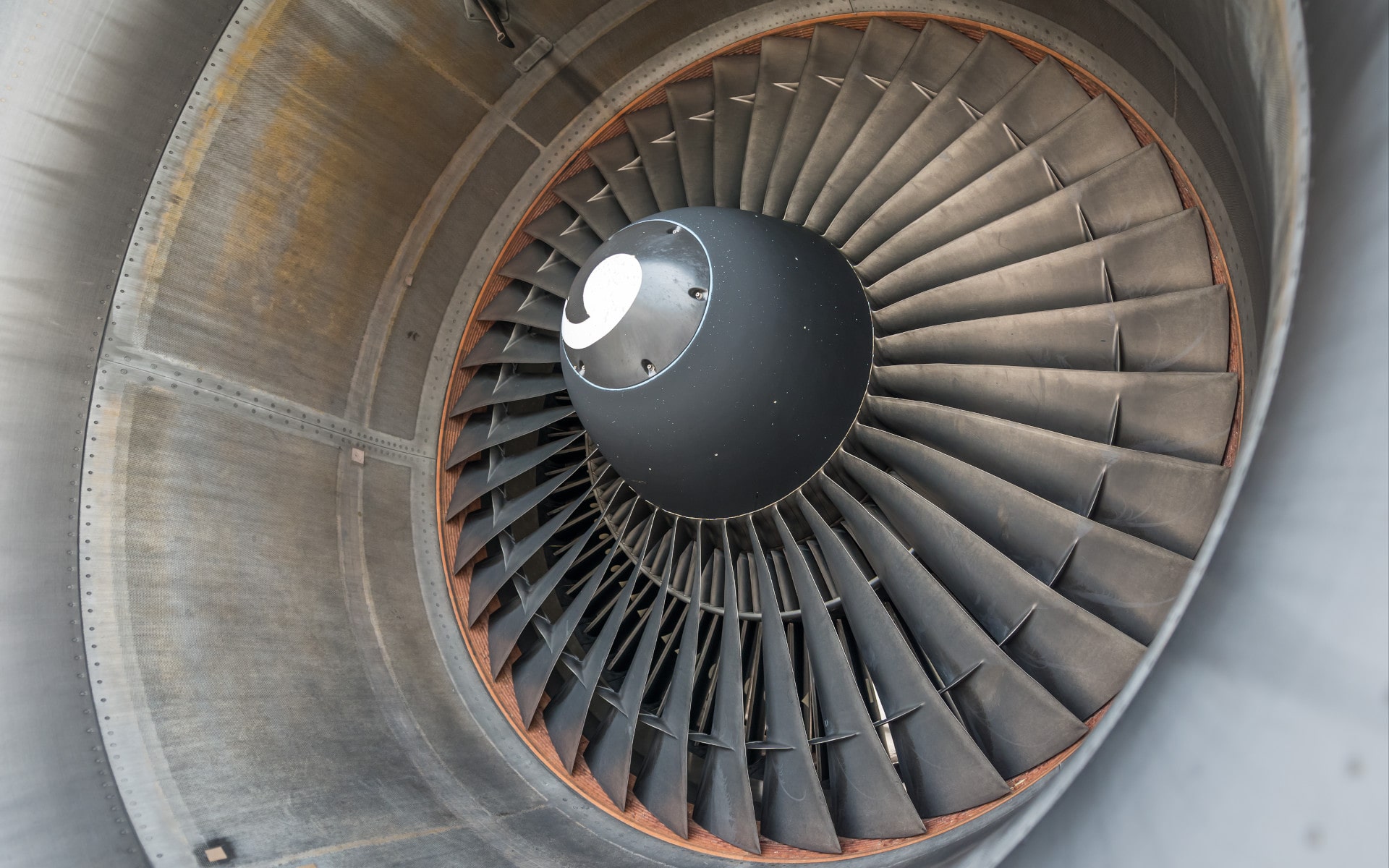 A&P mechanic supervising an apprentice in a general aviation hangar